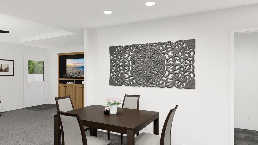 The INS382F REDWOOD II CLAYTON Dining Area. This Manufactured Mobile Home features 2 bedrooms and 2 baths.