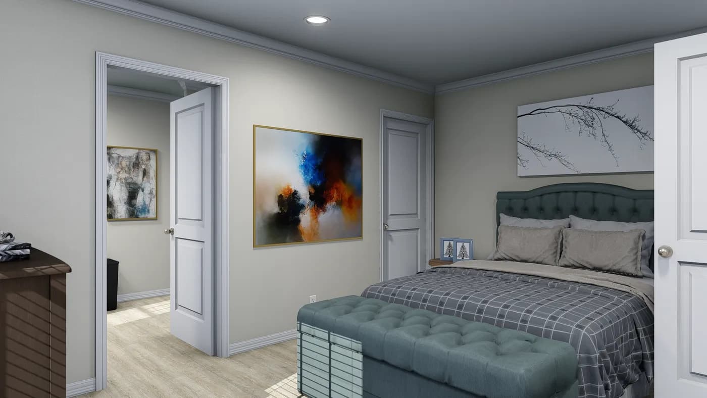 The 7010 "YADKIN" 7616 Primary Bedroom. This Manufactured Mobile Home features 3 bedrooms and 2 baths.