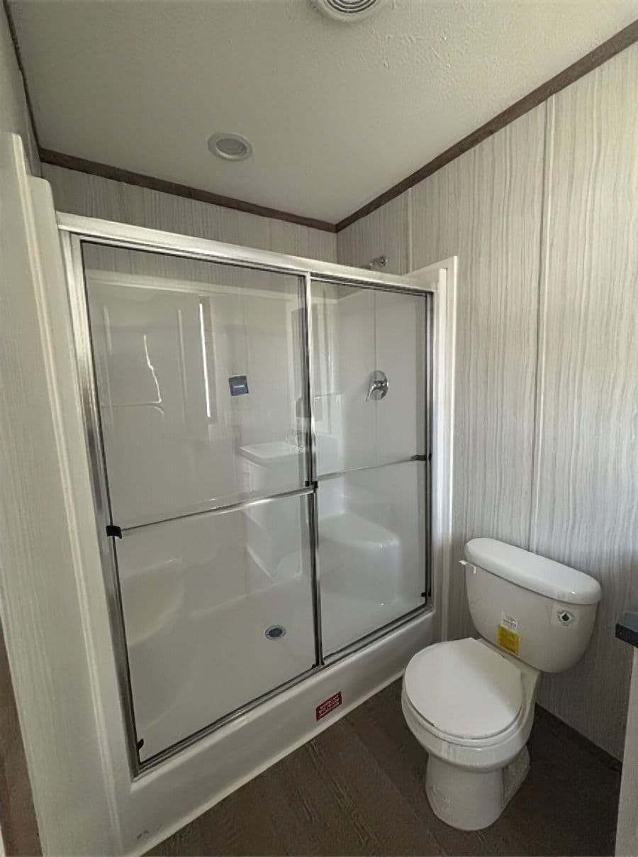 The APATITE 44 Primary Bathroom. This Manufactured Mobile Home features 3 bedrooms and 2 baths.