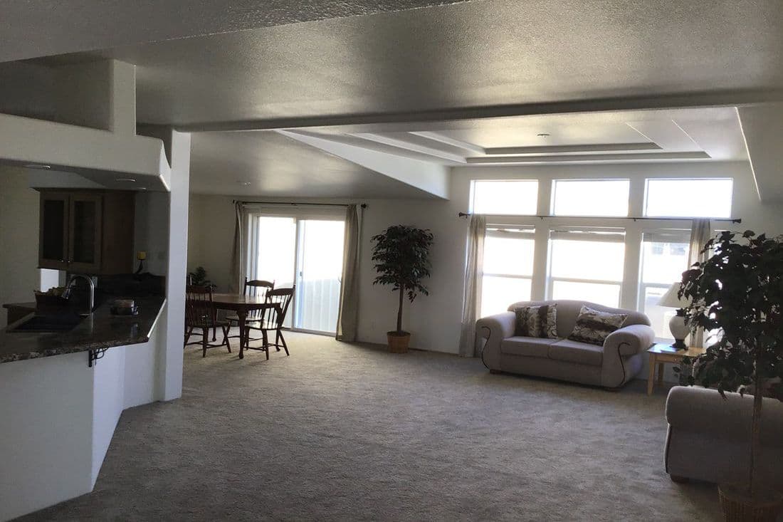 The 2022 COLUMBIA RIVER (NEW) Living Room. This Manufactured Mobile Home features 3 bedrooms and 2 baths.