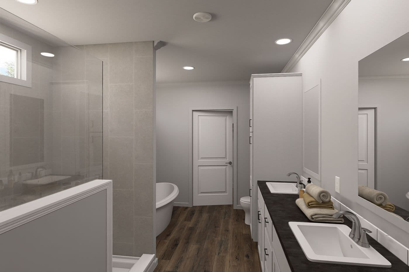 The THE VAIL 4 Primary Bathroom. This Manufactured Mobile Home features 4 bedrooms and 3 baths.