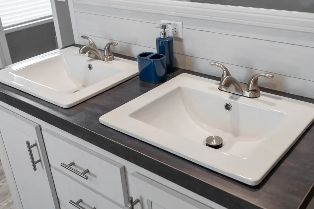 The LIBERTY Primary Bathroom. This Manufactured Mobile Home features 3 bedrooms and 2 baths.