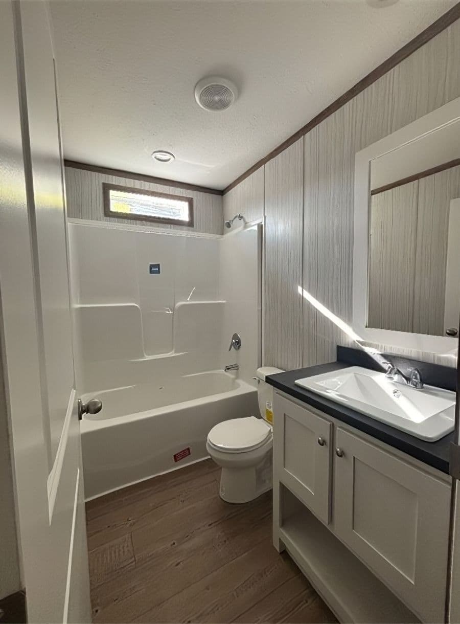 The APATITE 44 Guest Bathroom. This Manufactured Mobile Home features 3 bedrooms and 2 baths.