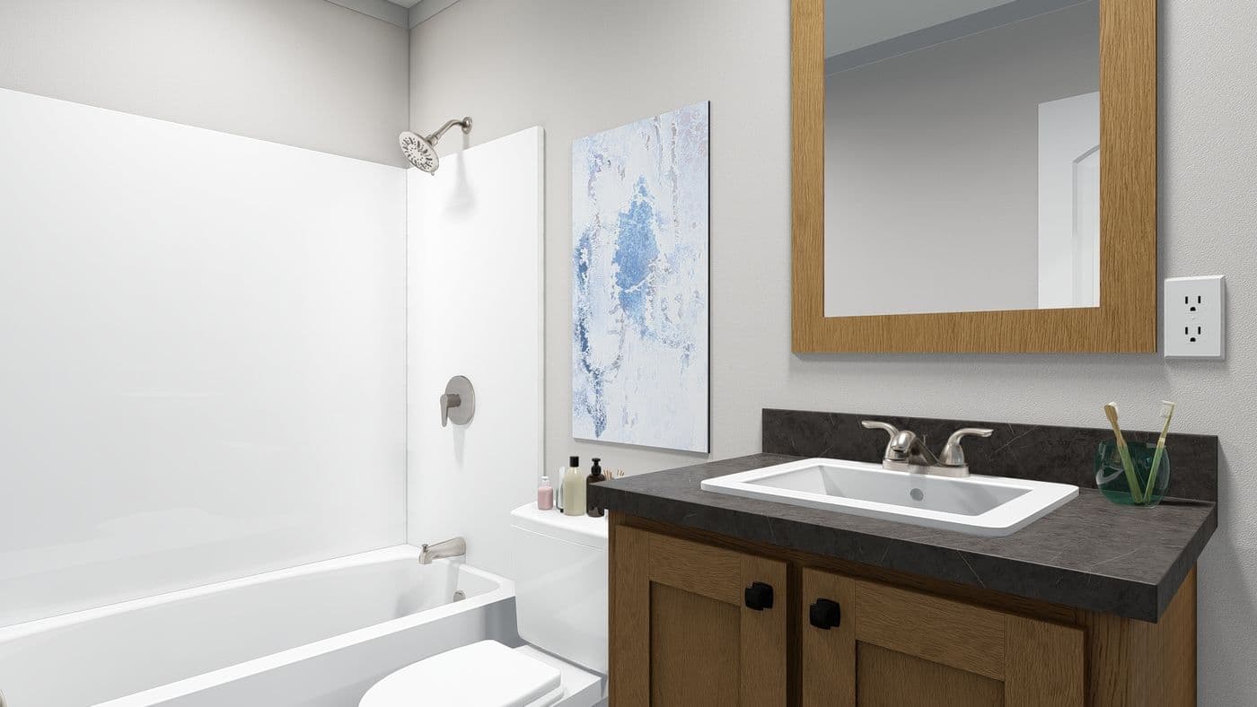The SWEET DREAMS Guest Bathroom. This Manufactured Mobile Home features 3 bedrooms and 2 baths.