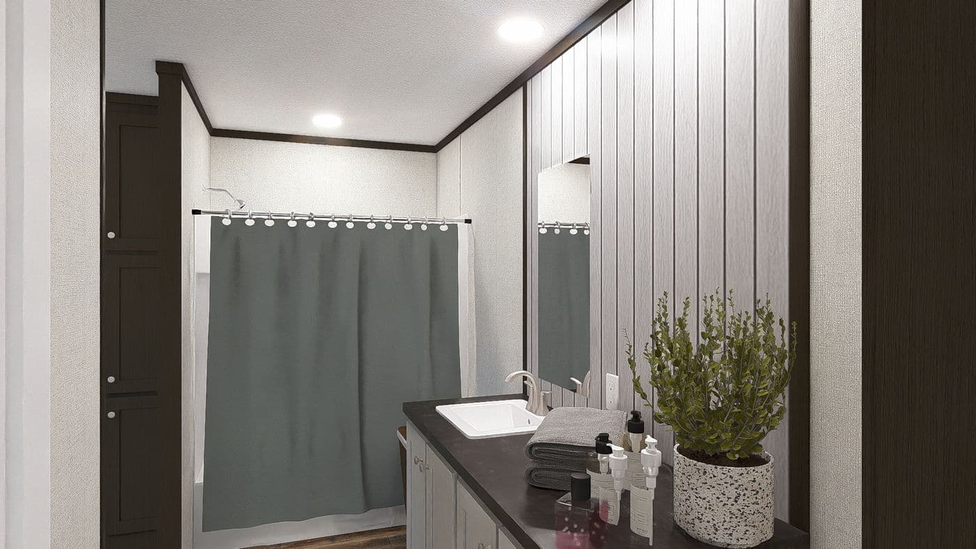 The OCCASION Primary Bathroom. This Manufactured Mobile Home features 4 bedrooms and 2 baths.
