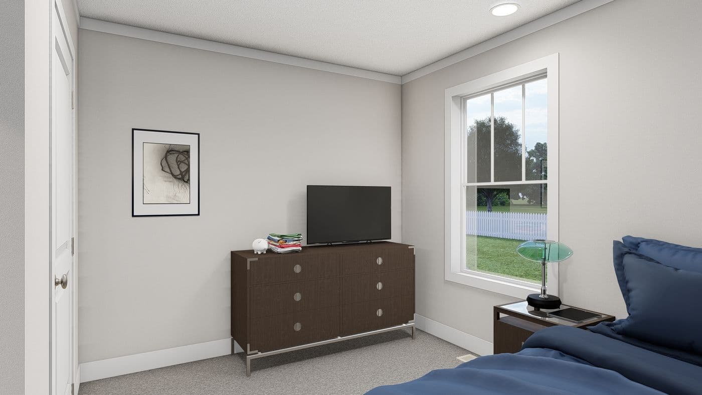 The THREE LITTLE BIRDS Bedroom. This Manufactured Mobile Home features 3 bedrooms and 2 baths.