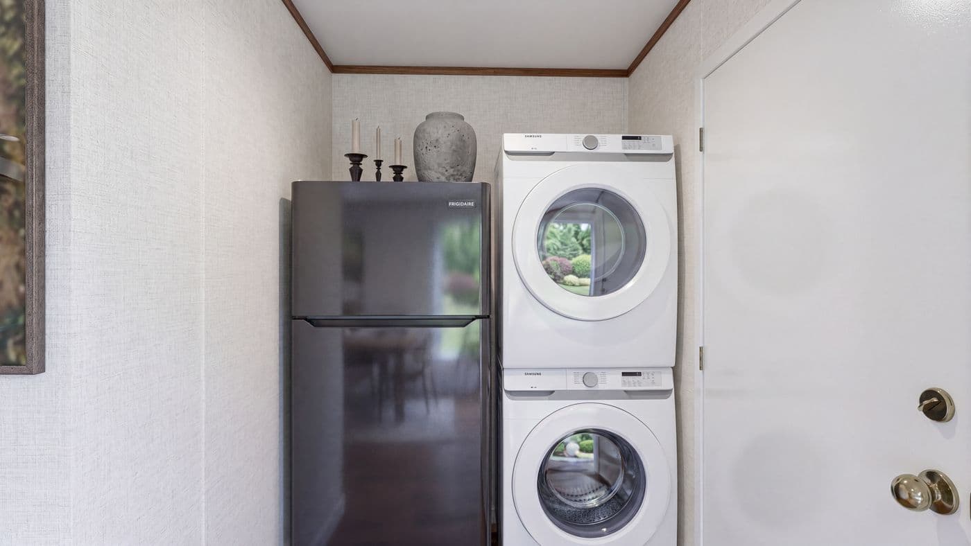 The BUTTERCUP Utility Room. This Manufactured Mobile Home features 1 bedroom and 1 bath.