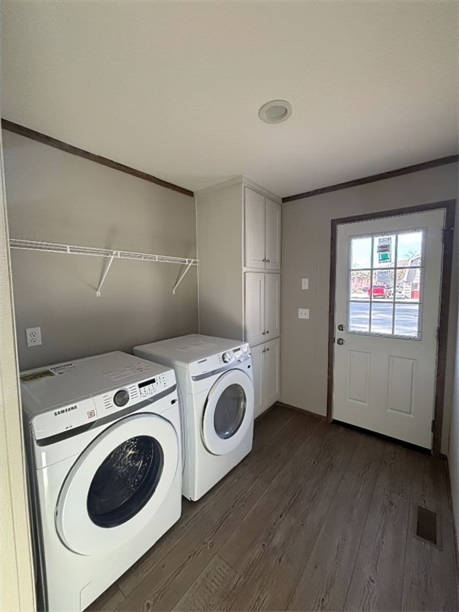 The APATITE 44 Utility Room. This Manufactured Mobile Home features 3 bedrooms and 2 baths.