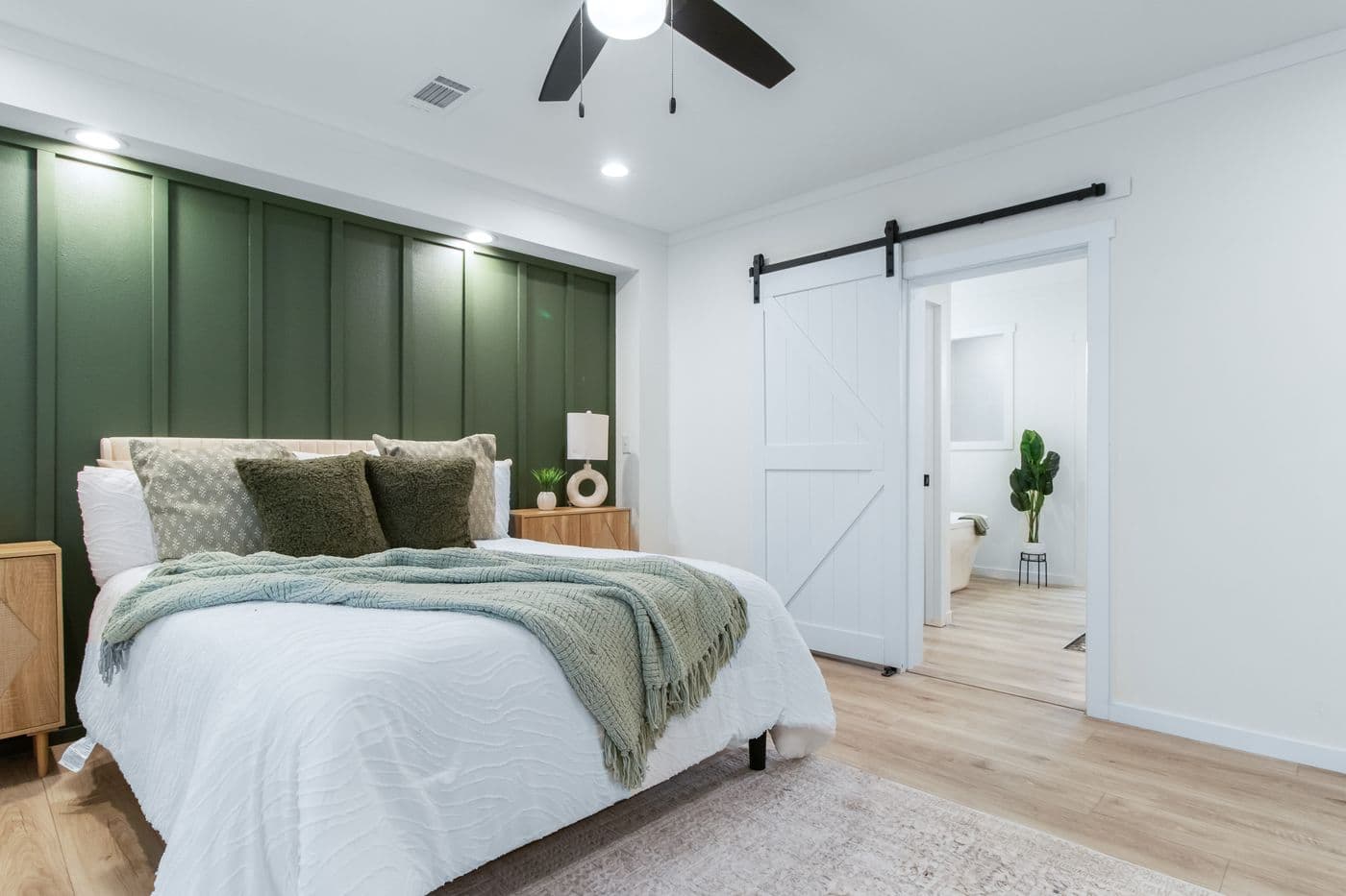 The THE VALENTINO Primary Bedroom. This Manufactured Mobile Home features 4 bedrooms and 2.5 baths.