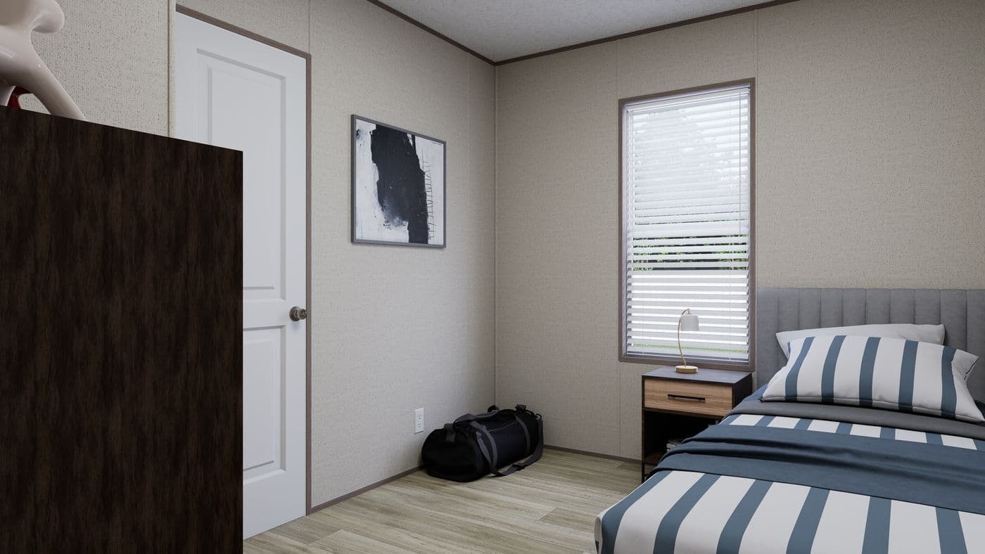 The ROCKY VALLEY Guest Bedroom. This Manufactured Mobile Home features 3 bedrooms and 2 baths.