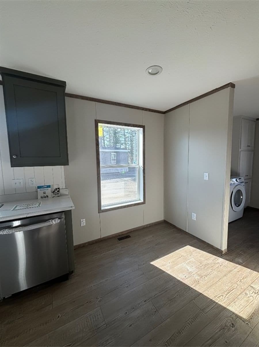 The APATITE 44 Kitchen. This Manufactured Mobile Home features 3 bedrooms and 2 baths.