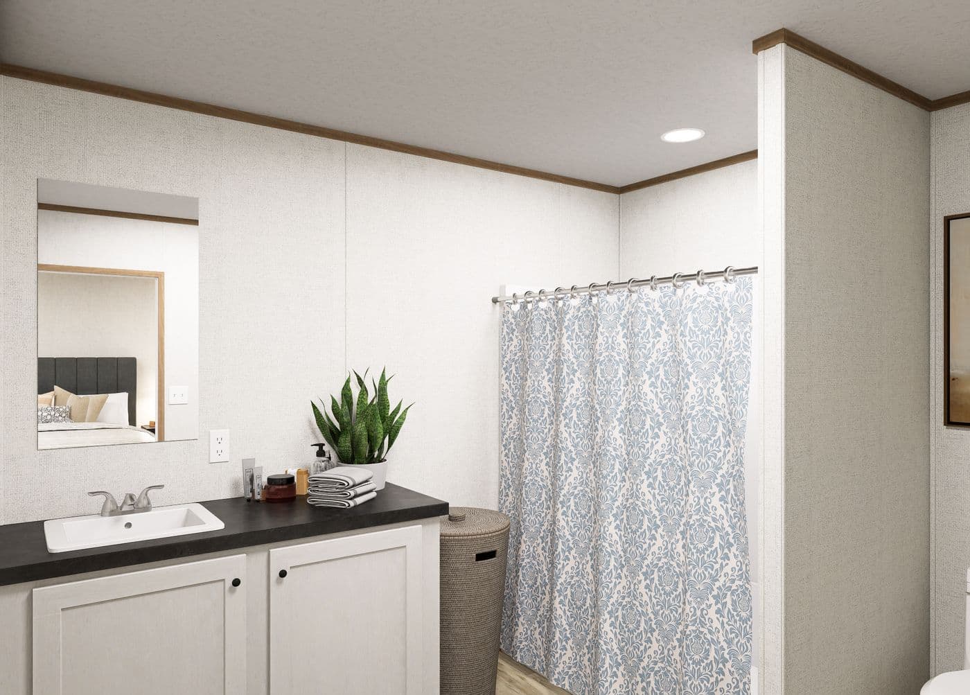 The EMBER Primary Bathroom. This Manufactured Mobile Home features 2 bedrooms and 2 baths.