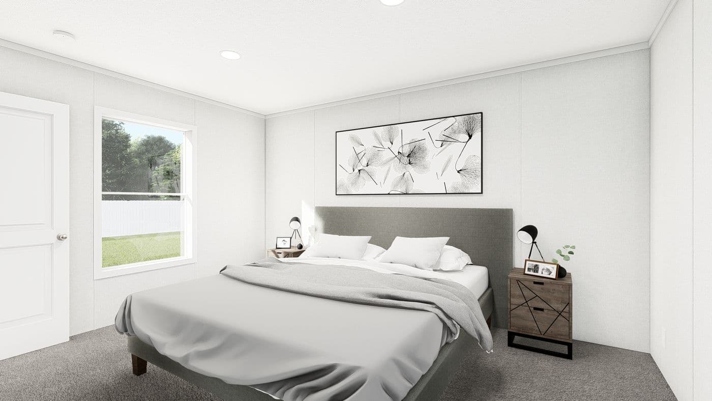 The PERIDOT Primary Bedroom. This Manufactured Mobile Home features 2 bedrooms and 1 bath.
