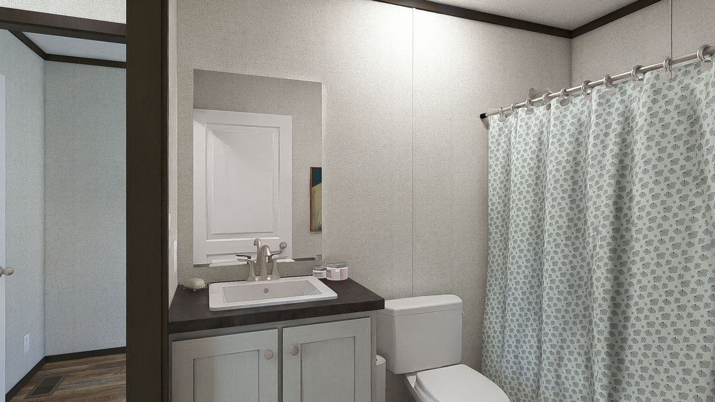 The FESTIVAL Guest Bathroom. This Manufactured Mobile Home features 3 bedrooms and 2 baths.