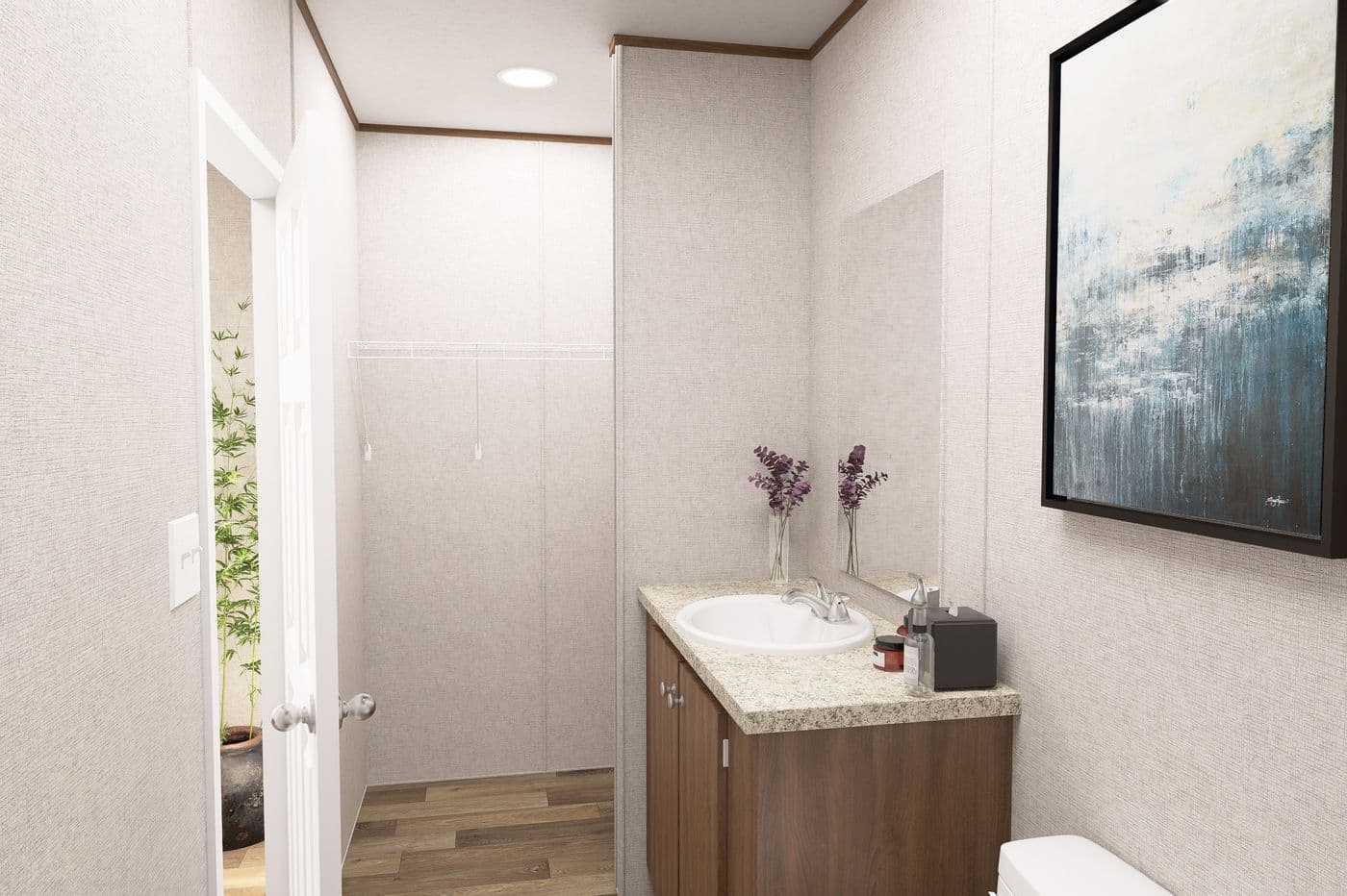 The HICKORY Primary Bathroom. This Manufactured Mobile Home features 3 bedrooms and 2 baths.