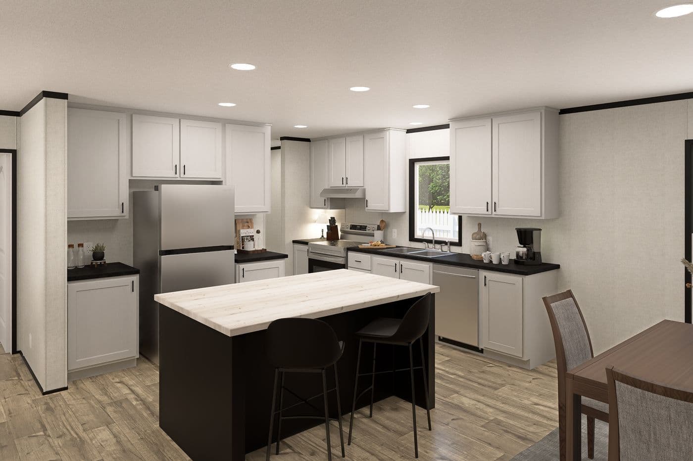 The THE MOUNTAINEER 48 Kitchen. This Manufactured Mobile Home features 3 bedrooms and 2 baths.