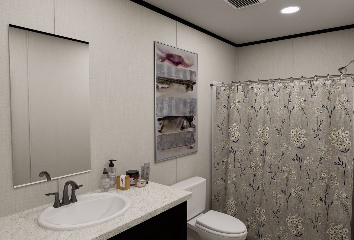 The ULTRA FLEX JEWEL GRANDE Guest Bathroom. This Manufactured Mobile Home features 4 bedrooms and 2 baths.