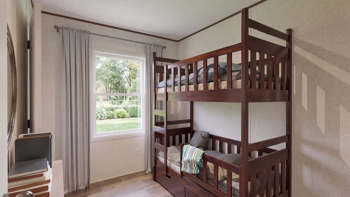 The CYPRESS Guest Bedroom. This Manufactured Mobile Home features 4 bedrooms and 2 baths.