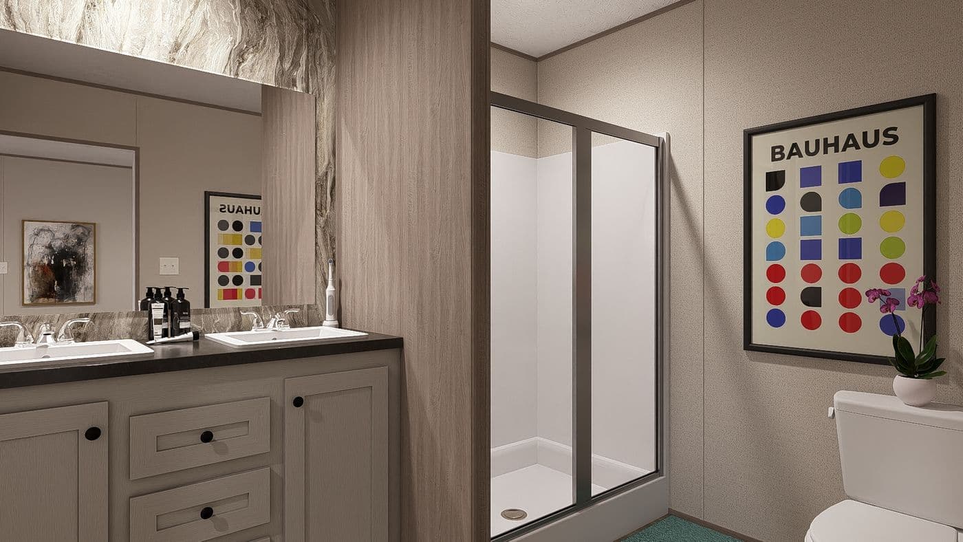 The BLAZER 66 F Primary Bathroom. This Manufactured Mobile Home features 3 bedrooms and 2 baths.