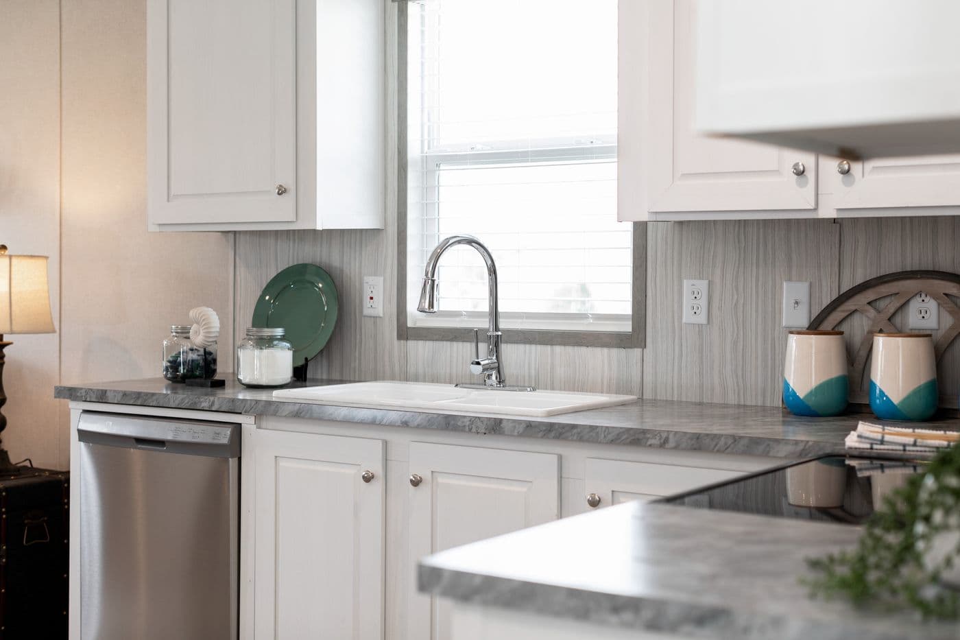 The BLAZER 76 F Kitchen. This Manufactured Mobile Home features 3 bedrooms and 2 baths.