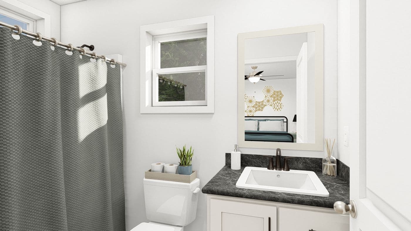 The DRM482P 2048' DREAM Primary Bathroom. This Manufactured Mobile Home features 2 bedrooms and 2 baths.