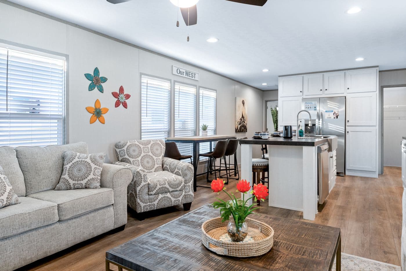 The RESOLUTION 16763X Living Room. This Manufactured Mobile Home features 3 bedrooms and 2 baths.