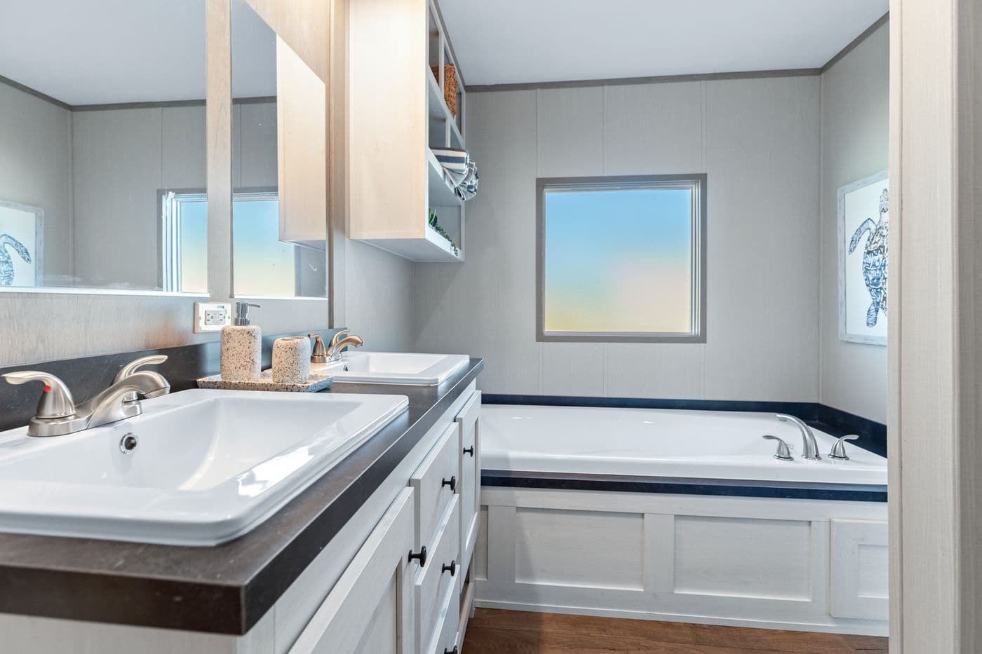 The RESOLUTION 16763X Primary Bathroom. This Manufactured Mobile Home features 3 bedrooms and 2 baths.