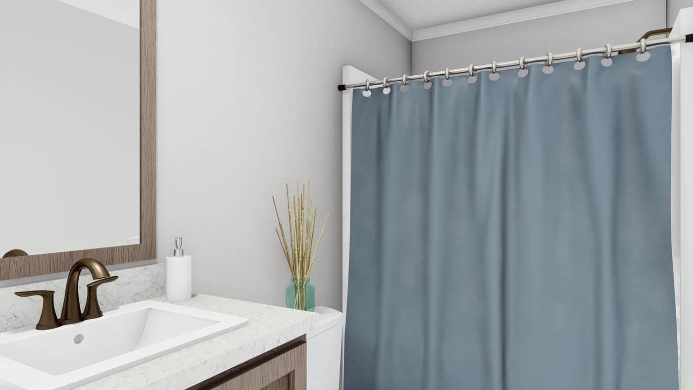 The THE SOUTHERN CHARM Guest Bathroom. This Manufactured Mobile Home features 3 bedrooms and 2 baths.