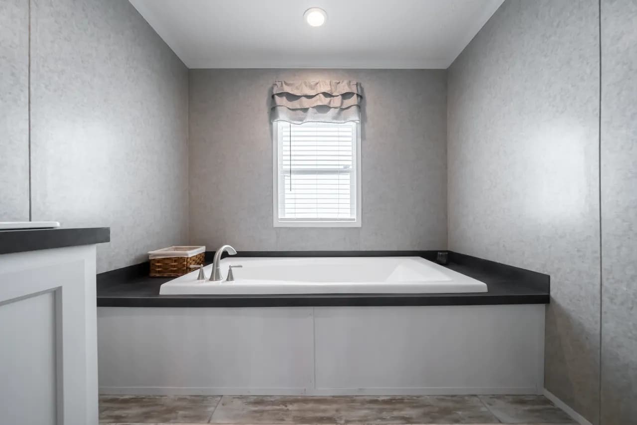 The NUMBER ONE Exterior. This Manufactured Mobile Home features 3 bedrooms and 2 baths.