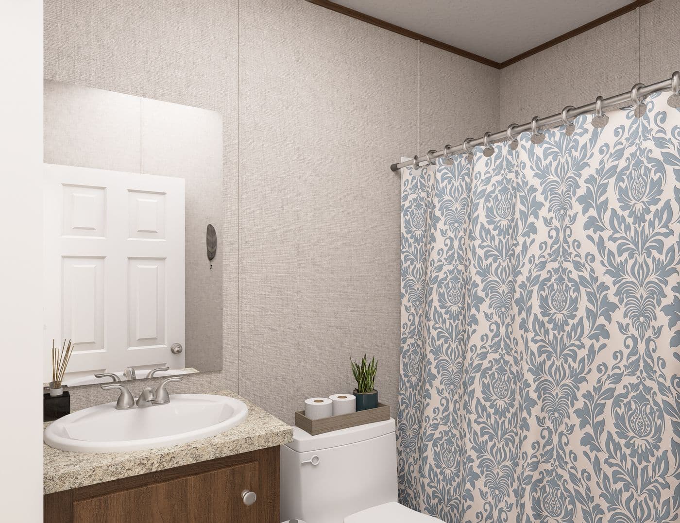 The DOGWOOD Guest Bathroom. This Manufactured Mobile Home features 2 bedrooms and 2 baths.