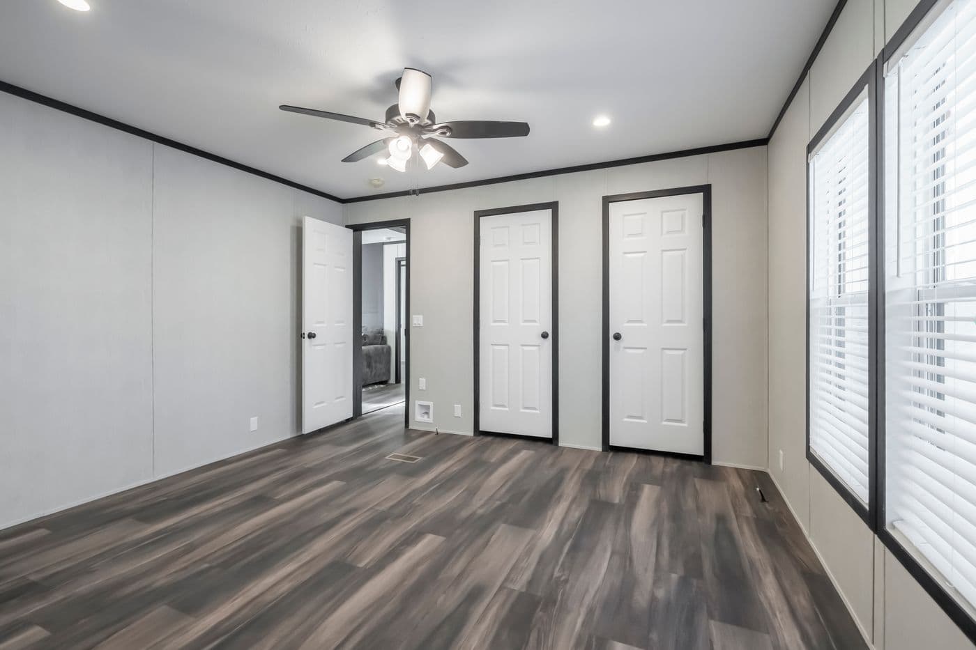The LIL SOUTHERN CHARM Bedroom. This Manufactured Mobile Home features 3 bedrooms and 2 baths.