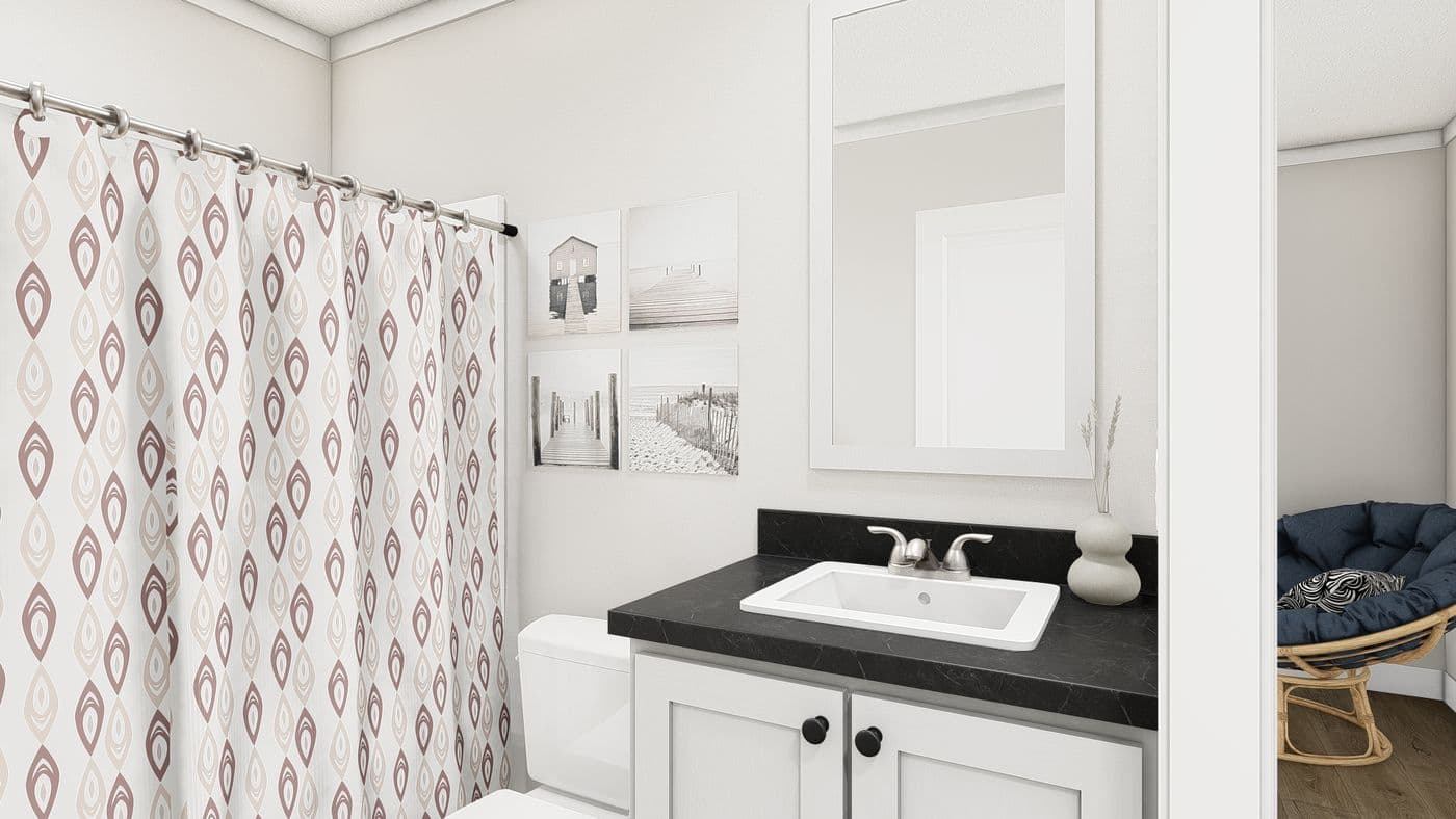 The SWEET CAROLINE Primary Bathroom. This Manufactured Mobile Home features 3 bedrooms and 2 baths.